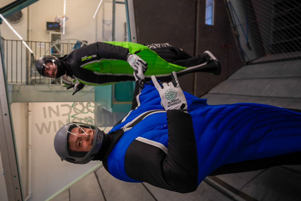 Flight masters Patrick Kramer (DE) and Arvid Endler (DE) flying wingsuit acrobatics in the inclined wind tunnel.